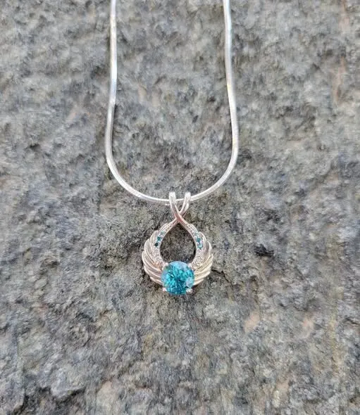 Blue Zircon And Diamond Ring