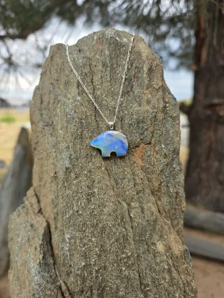 This custom ordered moonstone pendant shaped as a bear and set in sterling silver.