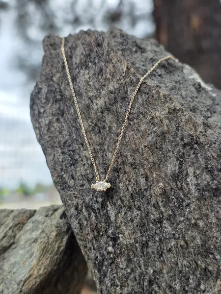 A beautiful Marquis cut Diamond set in 14k Gold.